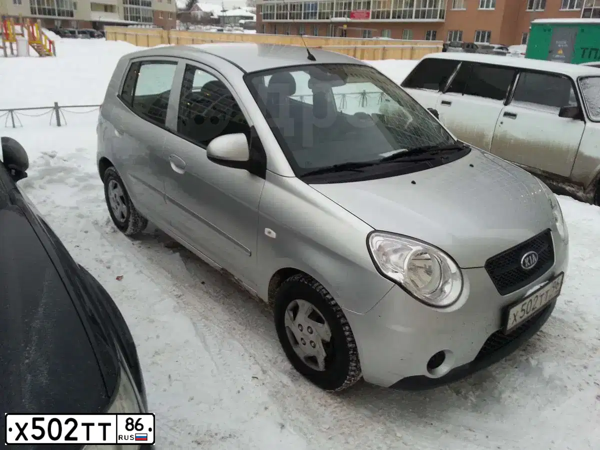 Фото автомобиля MITSUBISHI L 200, 2006 — госномер Х502ТТ86. Цвет: СЕРЕБРИСТЫЙ