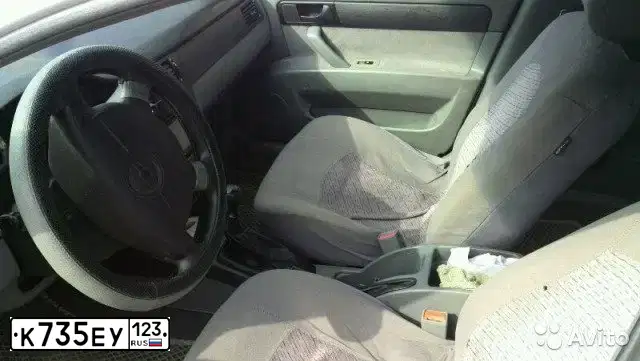 Фото автомобиля CHEVROLET LACETTI, 2008 — госномер Н412ВМ181. Цвет: Белый