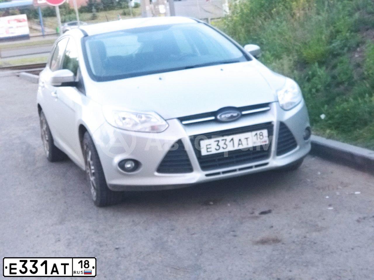 Фото автомобиля FORD FOCUS, 2012 — госномер Е331АТ18. Цвет: Серебристый