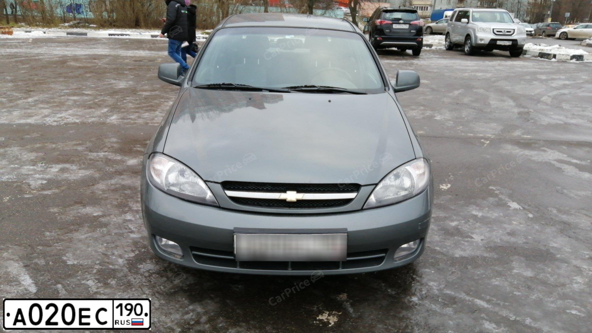 Фото автомобиля CHEVROLET LACETTI, 2011 — госномер А020ЕС190. Цвет: СЕРЫЙ