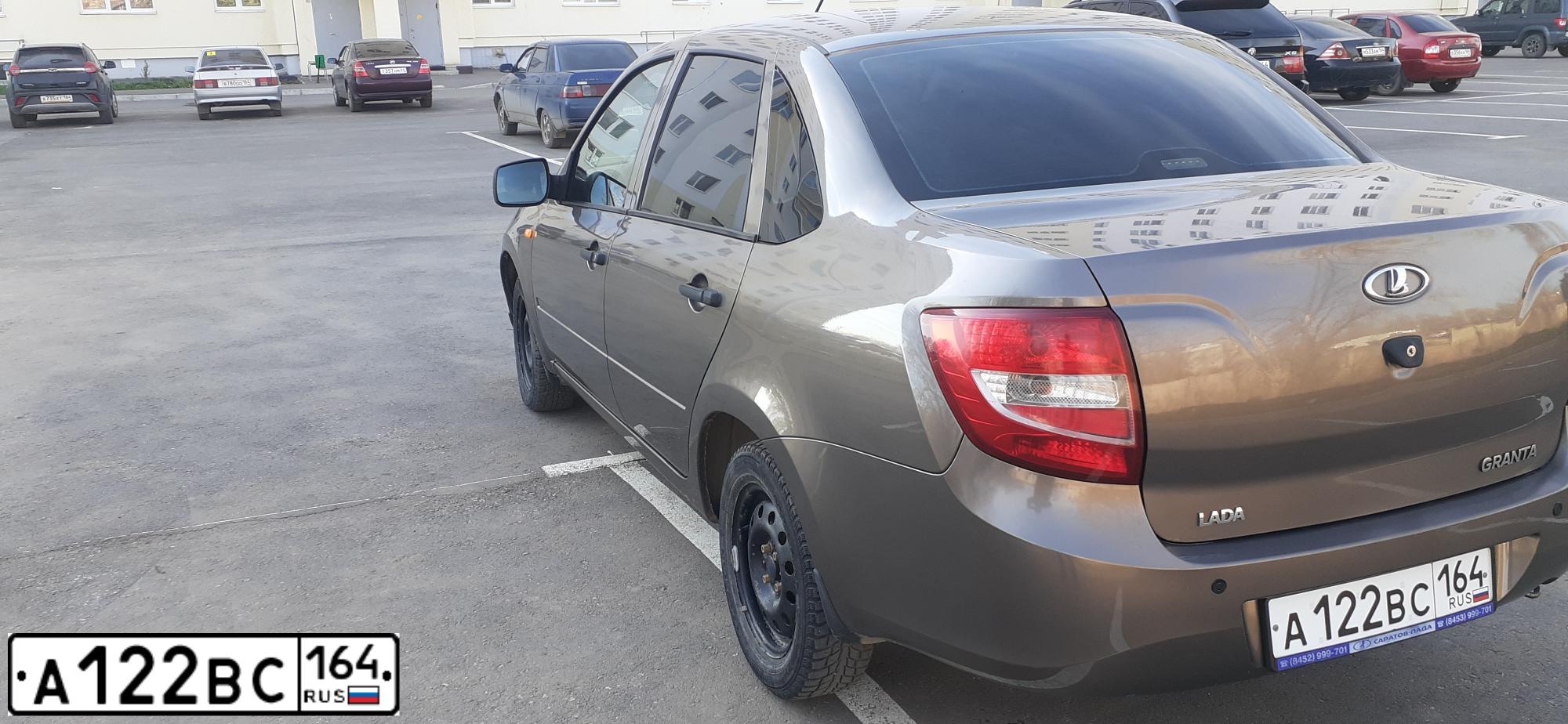 Фото автомобиля LADA 2190 GRANTA, 2014 — госномер А122ВС164. Цвет: Золотисто-Коричневый