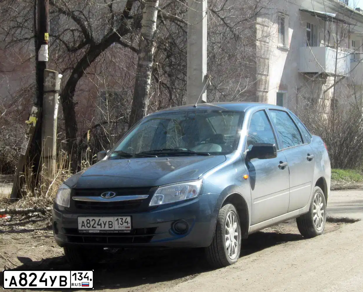 Фото автомобиля LADA 2190 GRANTA, 2014 — госномер А824УВ134. Цвет: СЕРО СИНИЙ