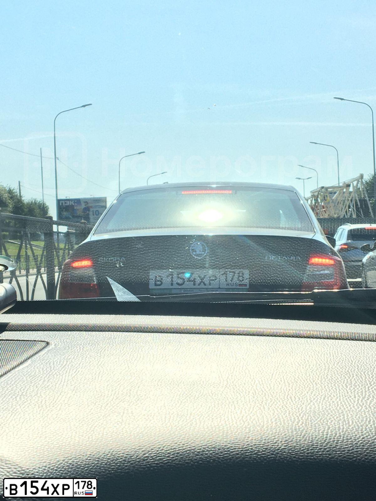 Фото автомобиля SKODA OCTAVIA, 2014 — госномер В154ХР178. Цвет: ЧЕРНЫЙ