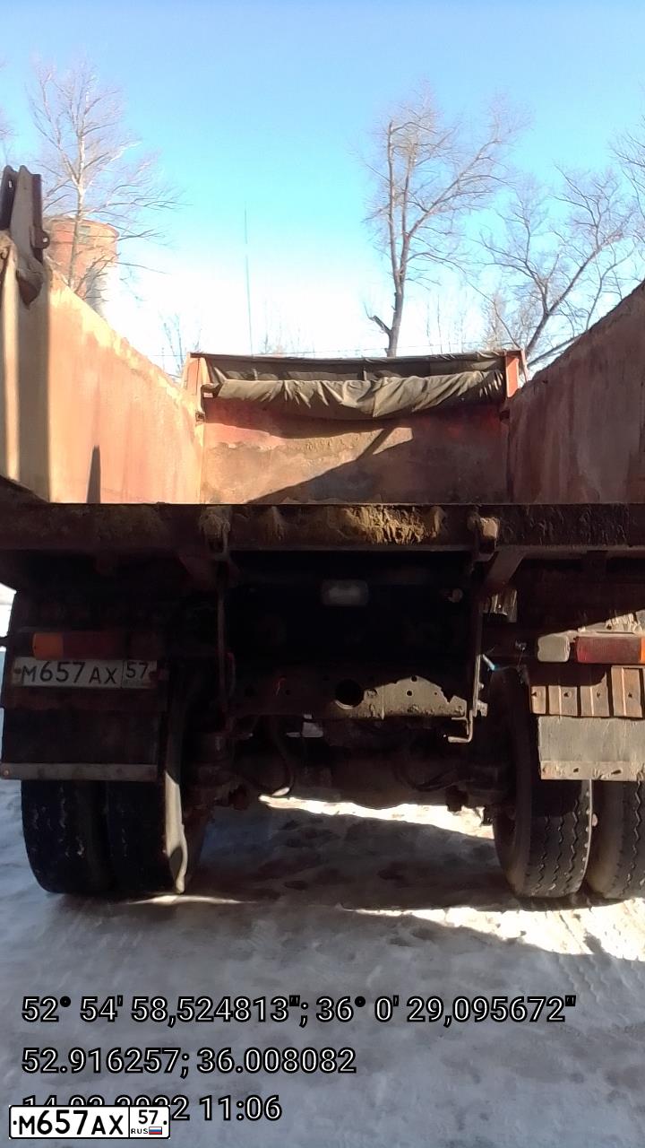 Фото автомобиля KAMAZ 65115 /6X4/, 2012 — госномер М657АХ57. Цвет: ОРАНЖЕВЫЙ