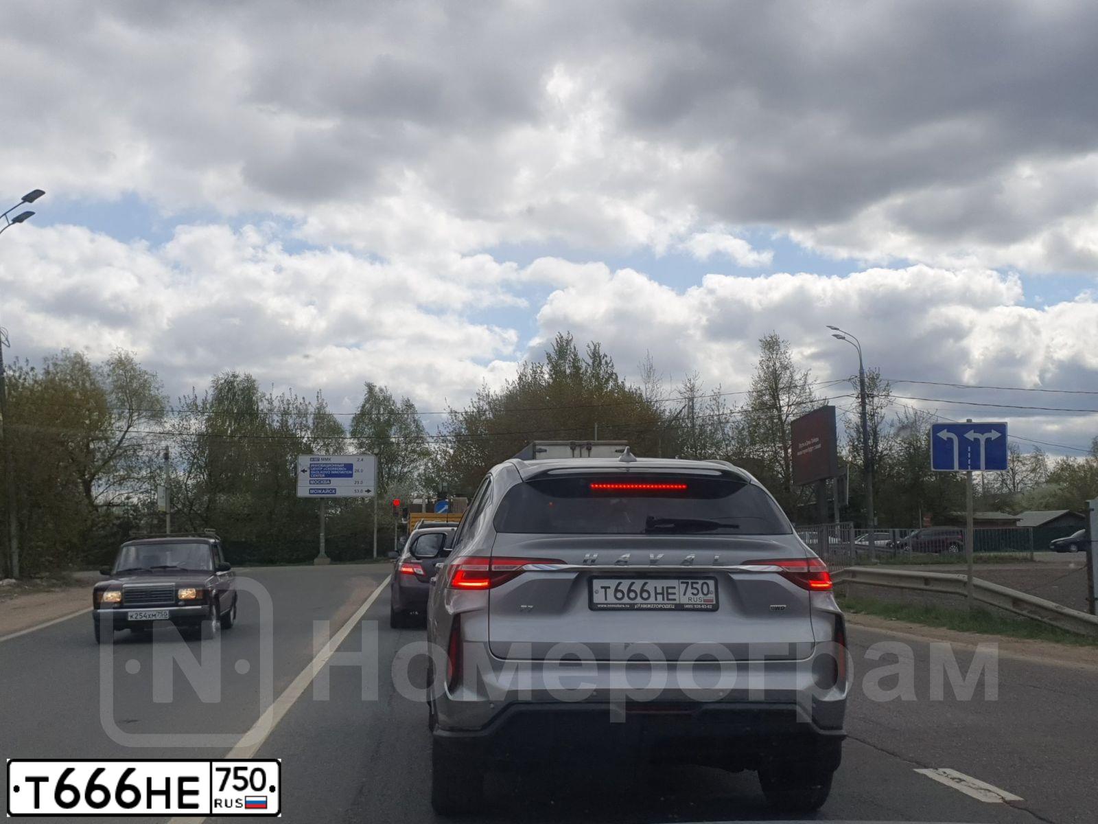 Фото автомобиля RENAULT LOGAN, 2014 — госномер Т666НЕ750. Цвет: синий