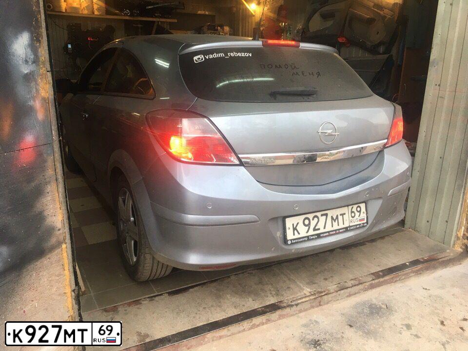 Фото автомобиля OPEL ASTRA, 2008 — госномер К927МТ69. Цвет: СЕРЫЙ
