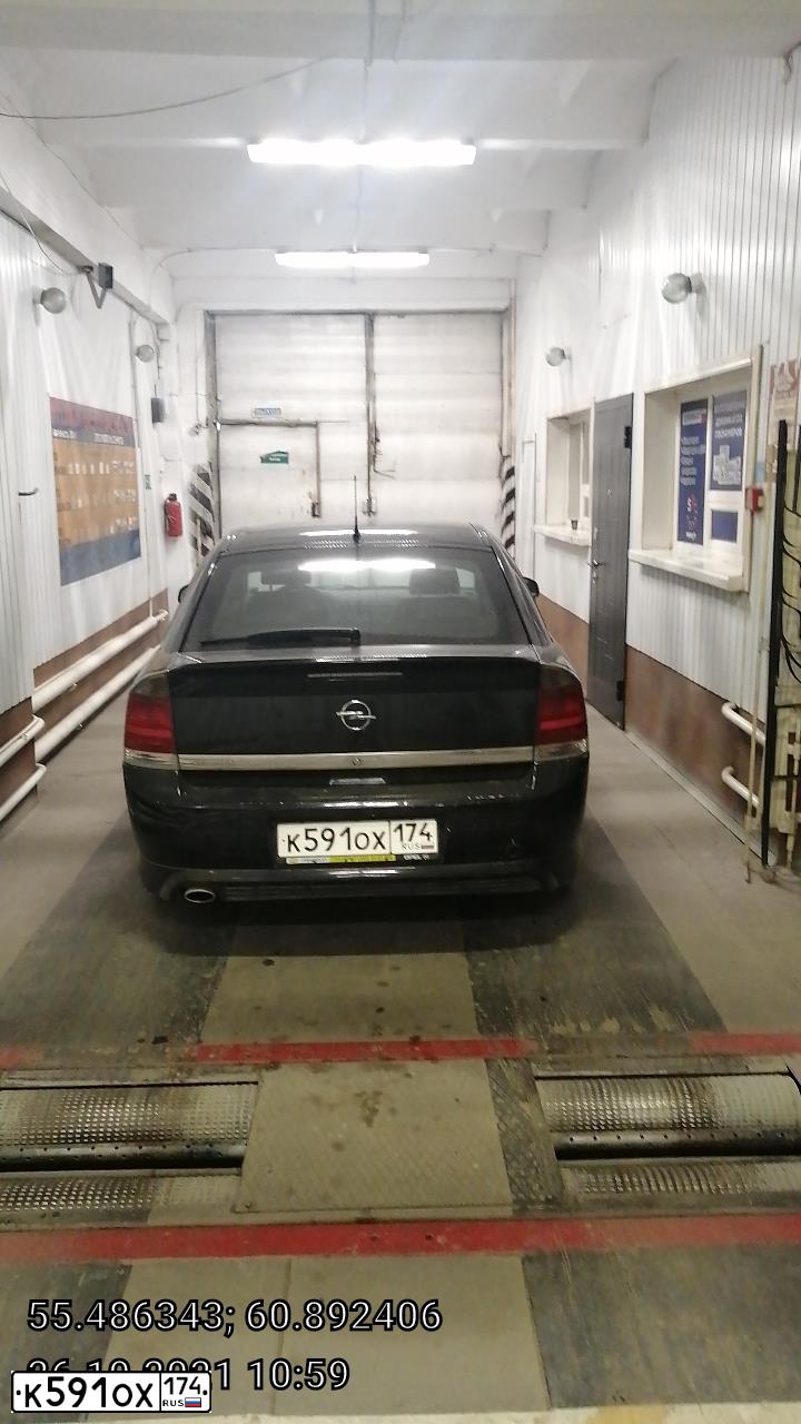 Фото автомобиля OPEL VECTRA, 2008 — госномер К591ОХ174. Цвет: ЧЕРНЫЙ