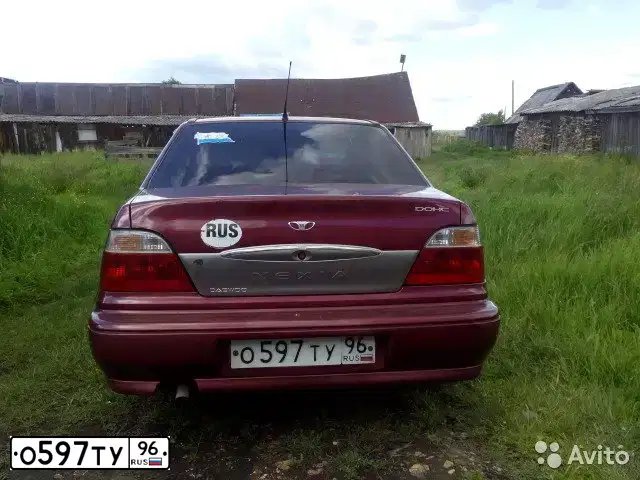 Фото автомобиля DAEWOO NEXIA, 2006 — госномер О597ТУ96. Цвет: ВИШНЕВЫЙ