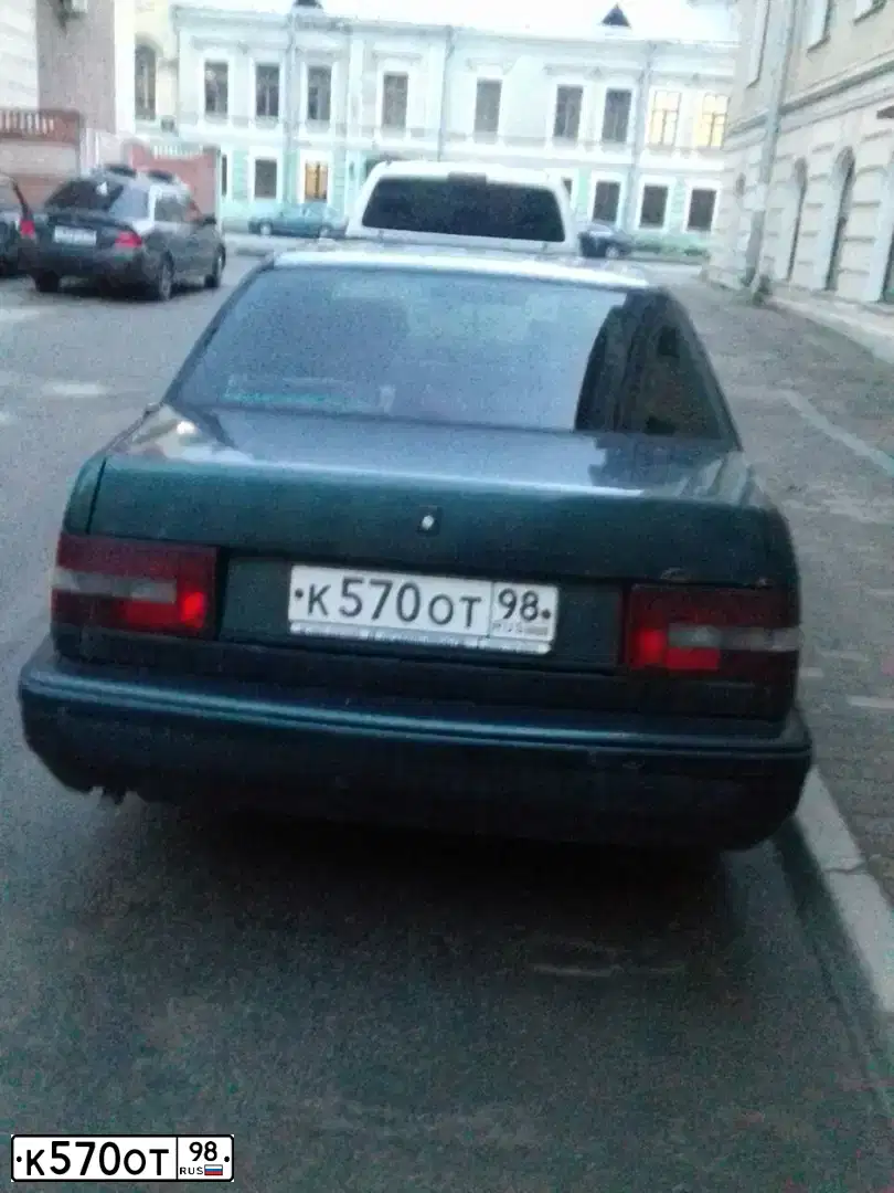 Фото автомобиля VOLVO 460, 1995 — госномер К570ОТ98. Цвет: ЗЕЛЕНЫЙ