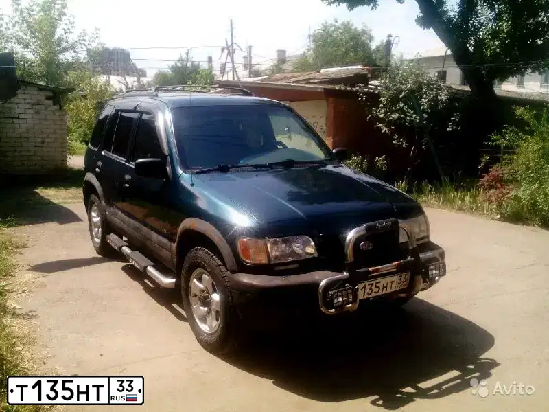 Фото автомобиля HYUNDAI TUCSON, 2008 — госномер Т135НТ33. Цвет: СЕРЕБРИСТЫЙ