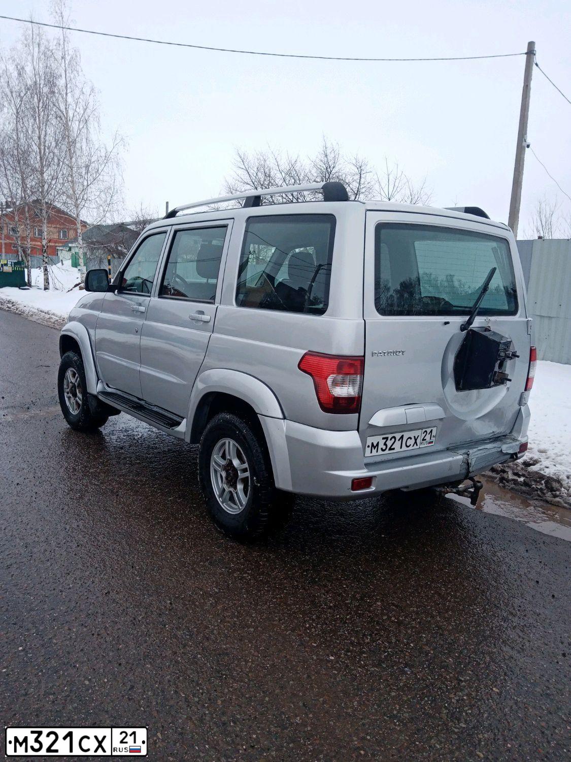Фото автомобиля UAZ 3163 PATRIOT, 2016 — госномер М321СХ21. Цвет: СЕРЕБРИСТЫЙ МЕТАЛЛИК