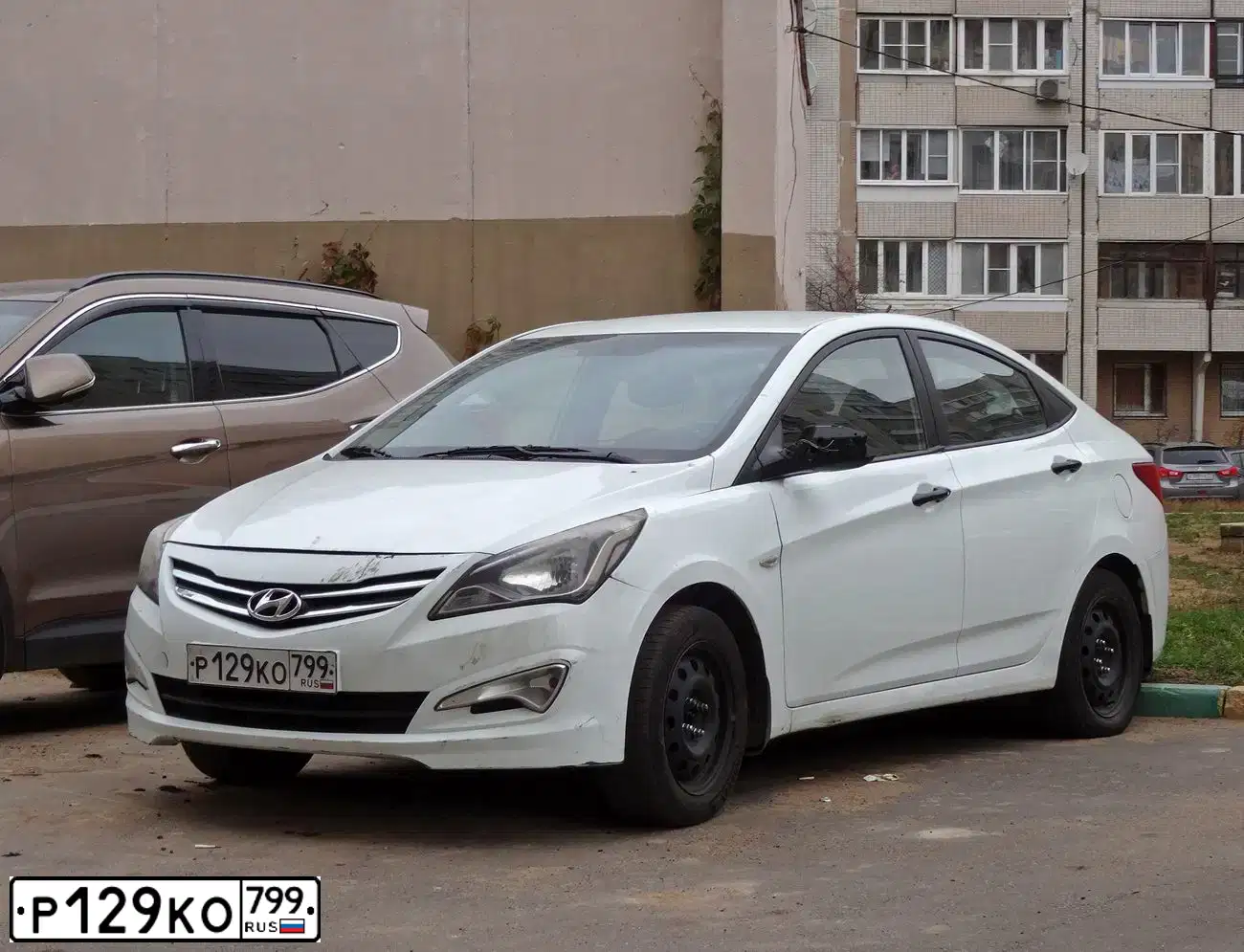 Фото автомобиля HYUNDAI SOLARIS, 2015 — госномер В324УТ37. Цвет: Белый