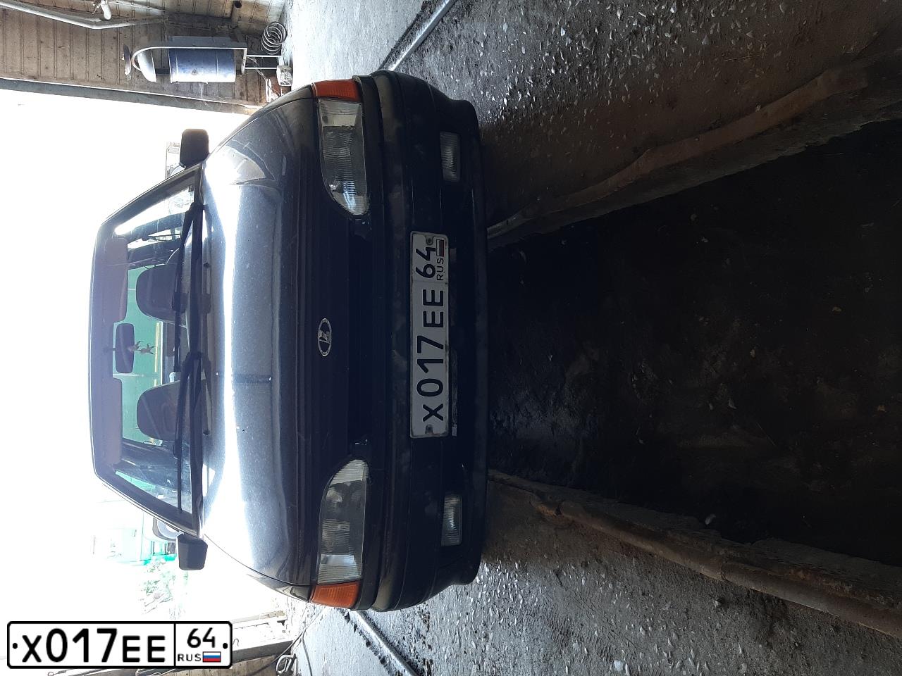 Фото автомобиля LADA 2115 SAMARA, 2010 — госномер Х017ЕЕ64. Цвет: ЧЕРНЫЙ