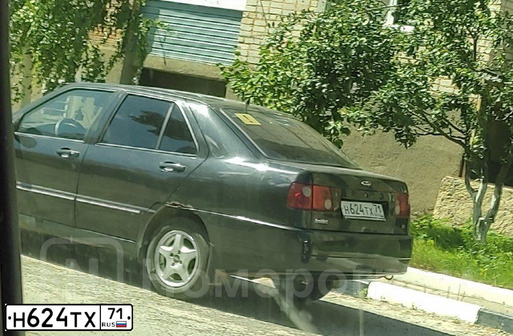 Фото автомобиля CHERY AMULET /FLAGCLOUD/, 2007 — госномер Н624ТХ71. Цвет: ЧЕРНЫЙ