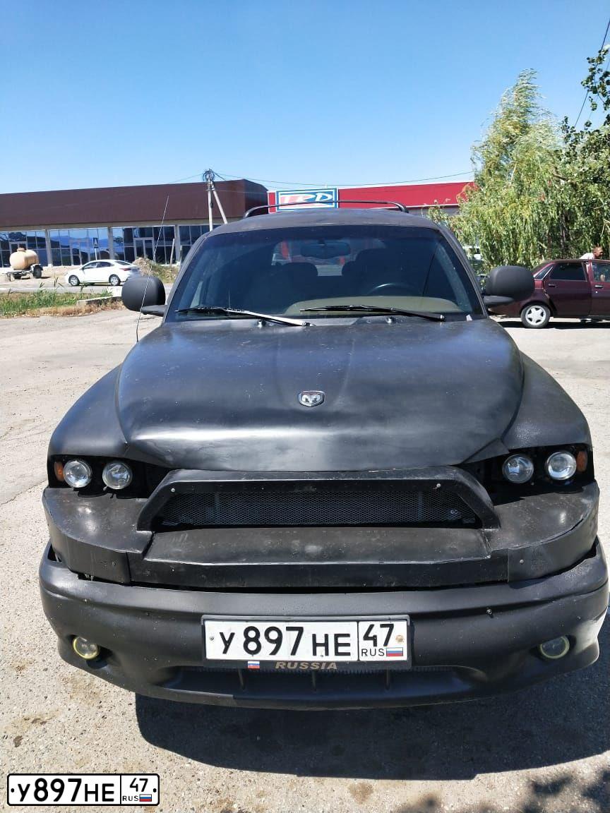 Фото автомобиля DODGE DURANGO, 2000 — госномер Н027ВЕ199. Цвет: ЧЕРНЫЙ