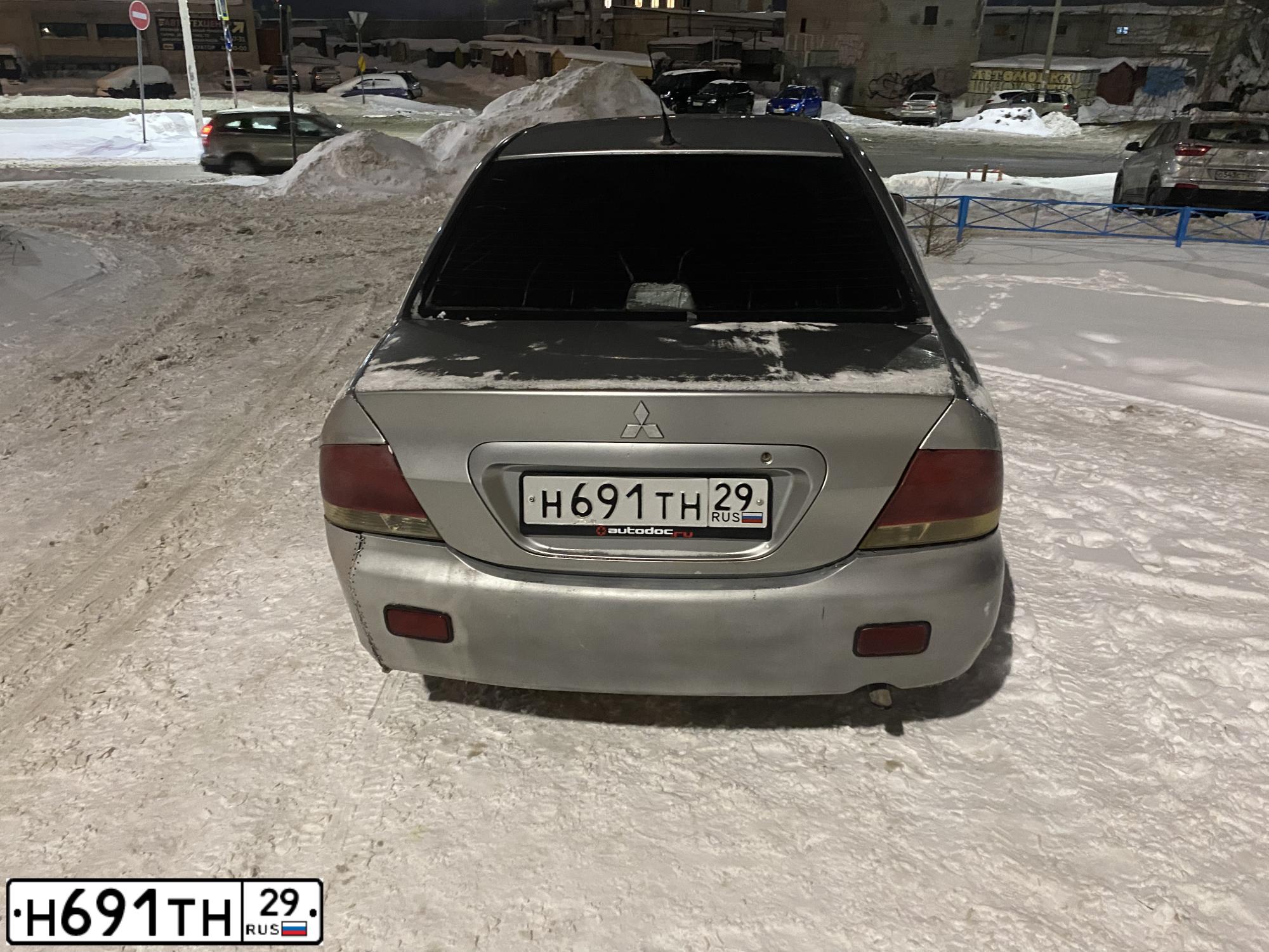 Фото автомобиля MITSUBISHI LANCER, 2004 — госномер Н691ТН29. Цвет: СЕРЕБРИСТЫЙ