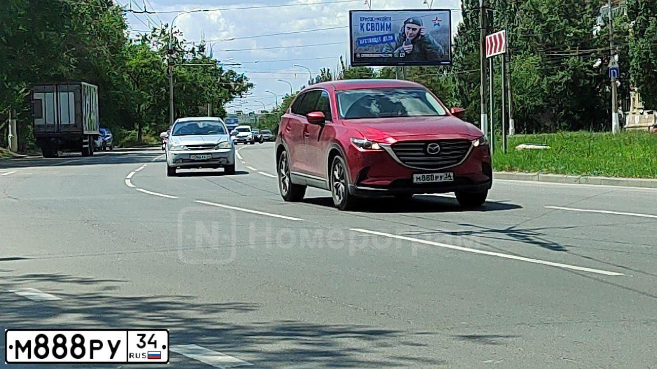 Фото автомобиля NISSAN QASHQAI, 2008 — госномер М888РУ34. Цвет: ЧЕРНЫЙ