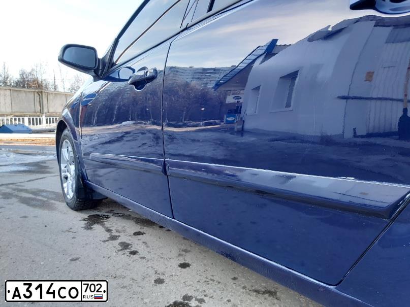 Фото автомобиля OPEL ASTRA, 2007 — госномер Е018ЕС102. Цвет: синий