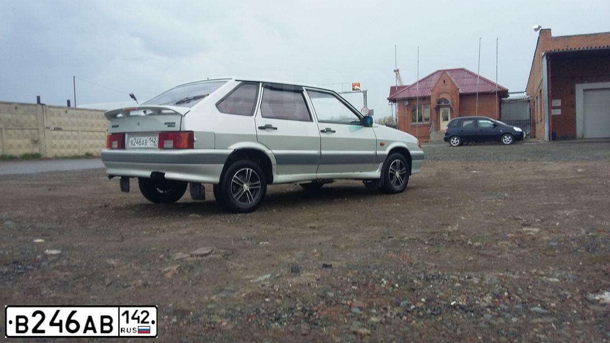 Фото автомобиля LADA 2114 SAMARA, 2005 — госномер В246АВ142. Цвет: МОЛОЧНО-БЕЛЫЙ СЕРЕБРИСТЫЙ