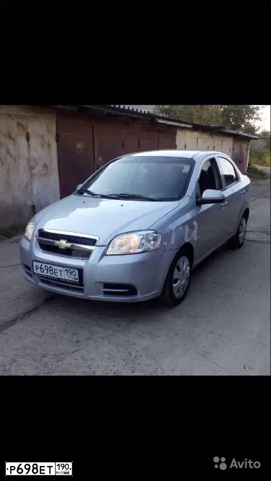 Фото автомобиля CHEVROLET AVEO, 2010 — госномер М568ЕО29. Цвет: Серебристый