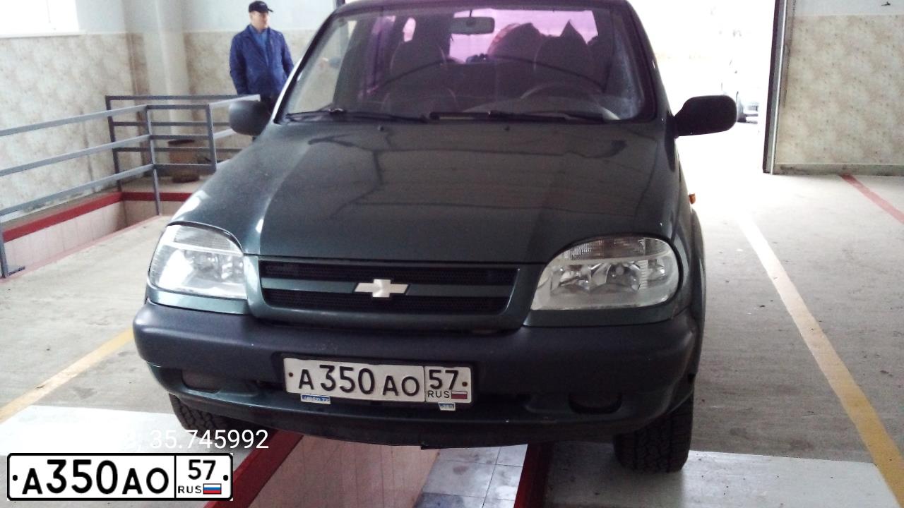 Фото автомобиля CHEVROLET NIVA, 2006 — госномер А350АО57. Цвет: Т СЕРО ЗЕЛЕНЫЙ МЕТ