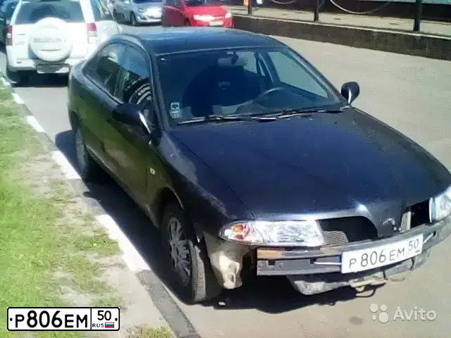 Фото автомобиля MITSUBISHI CARISMA, 2002 — госномер Р806ЕР50. Цвет: ЧЕРНЫЙ