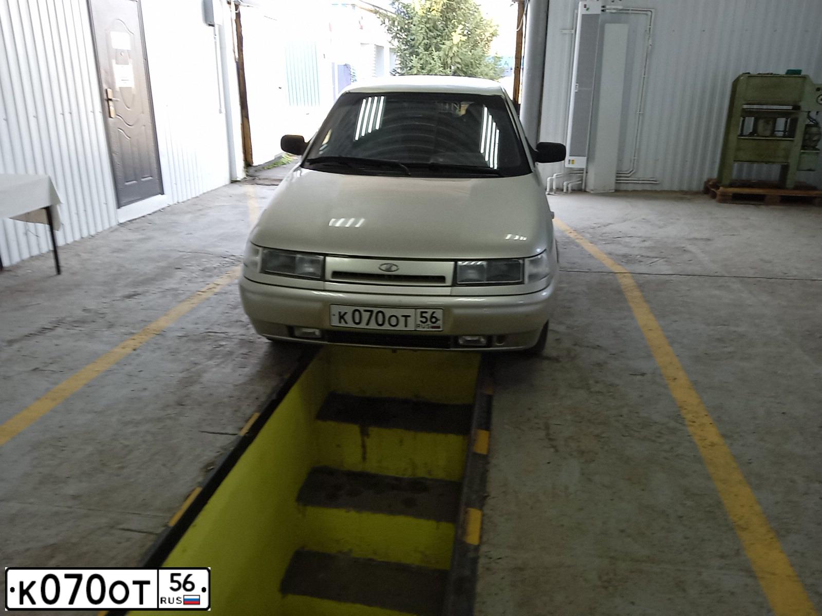 Фото автомобиля FORD FOCUS, 2009 — госномер К070ОТ56. Цвет: Белый