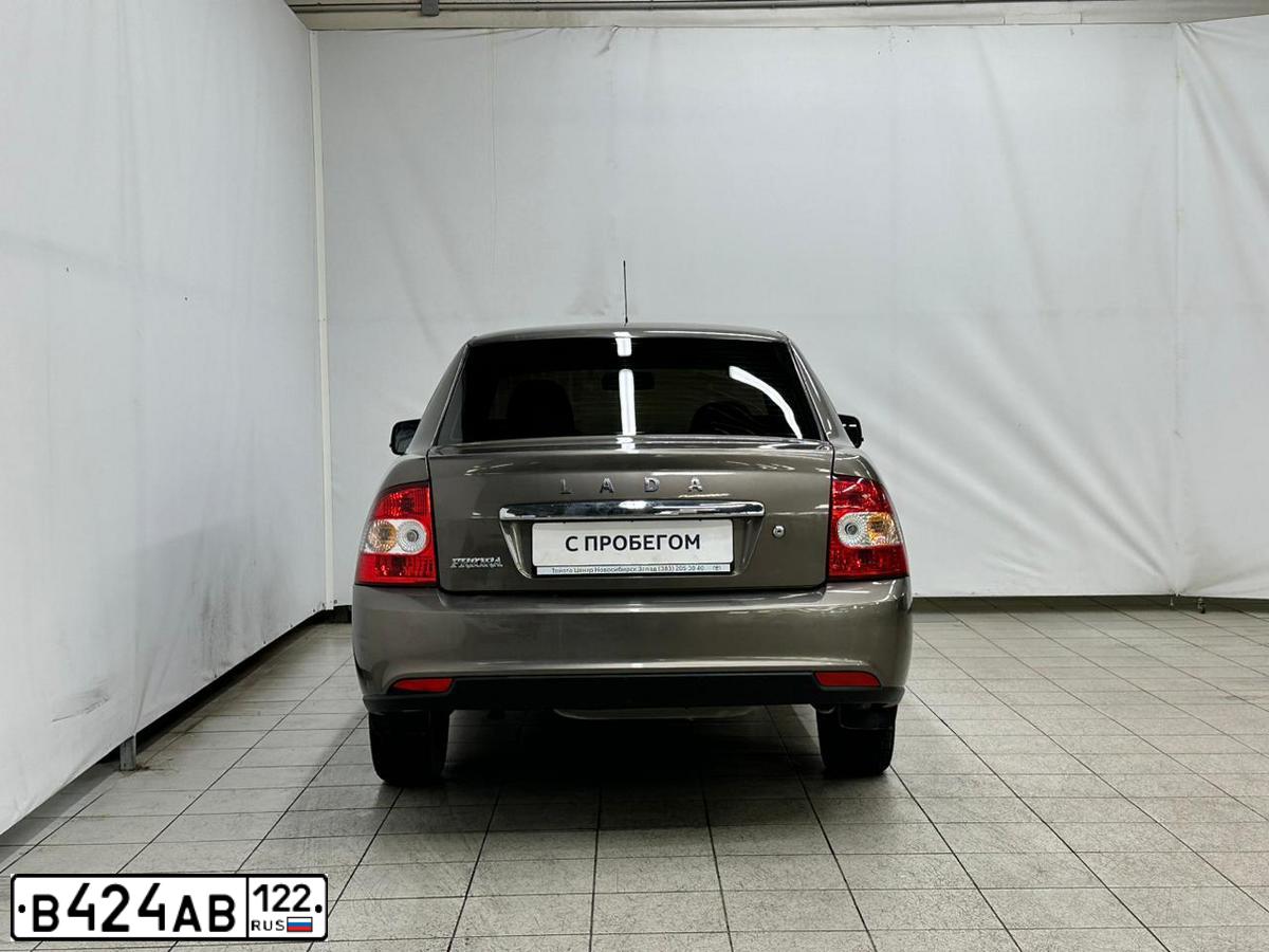Фото автомобиля LADA PRIORA, 2017 — госномер С248РК142. Цвет: Золотисто-коричневый