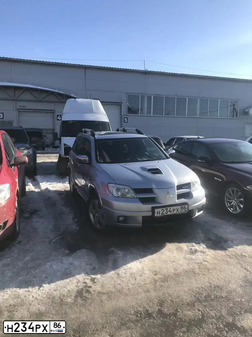 Фото автомобиля MITSUBISHI OUTLANDER, 2007 — госномер Т028ОХ72. Цвет: Серебристый