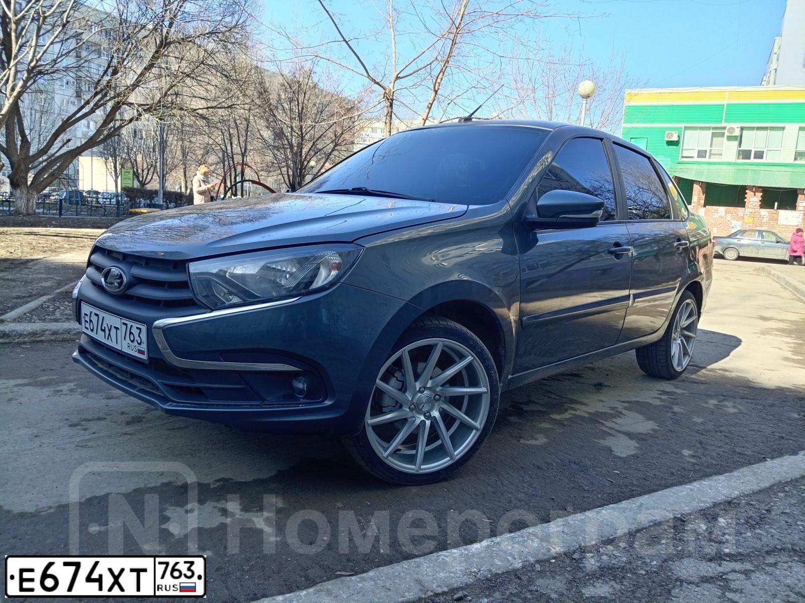 Фото автомобиля LADA 2190 GRANTA, 2019 — госномер Е674ХТ763. Цвет: Серебристо темно  серый