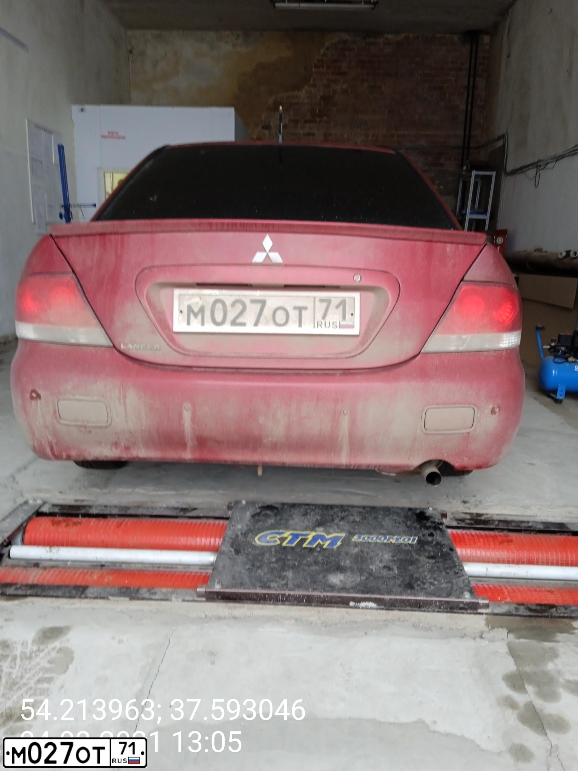 Фото автомобиля MITSUBISHI LANCER, 2007 — госномер М027ОТ71. Цвет: Красный