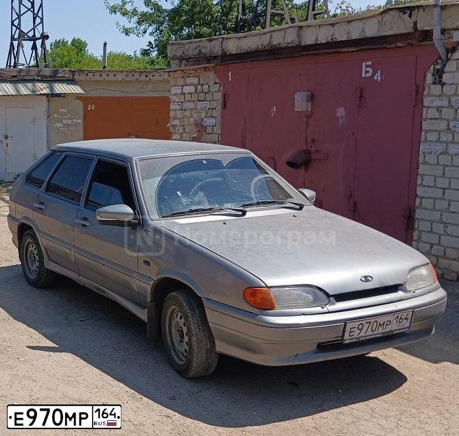 Фото автомобиля LADA 2114 SAMARA, 2005 — госномер Е970МР164. Цвет: СРЕДНИЙ СЕРО-ЗЕЛЕНЫЙ МЕТ.
