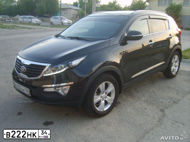 Фото автомобиля KIA SPORTAGE, 2013 — госномер Е544РХ134. Цвет: ЧЕРНЫЙ ПЕРЛАМУТР