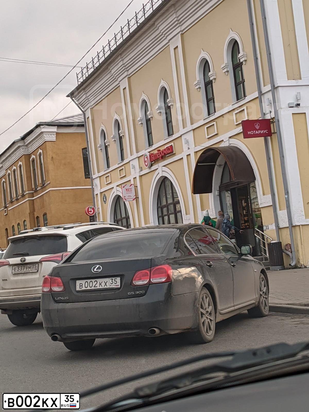 Фото автомобиля KIA RIO, 2012 — госномер В002ХК35. Цвет: ЧЕРНЫЙ