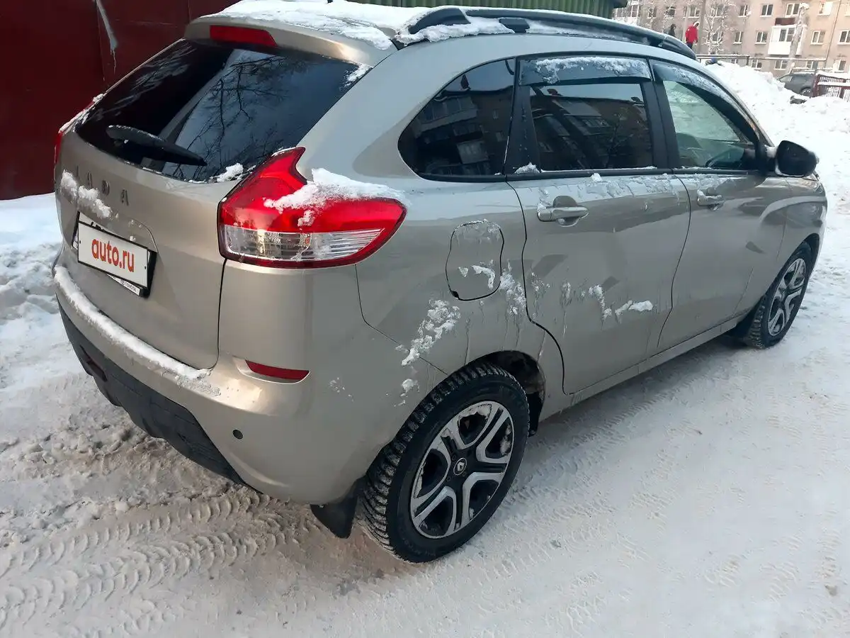 Фото автомобиля LADA XRAY, 2017 — госномер О633ЕВ29. Цвет: СЕРО-БЕЖЕВЫЙ