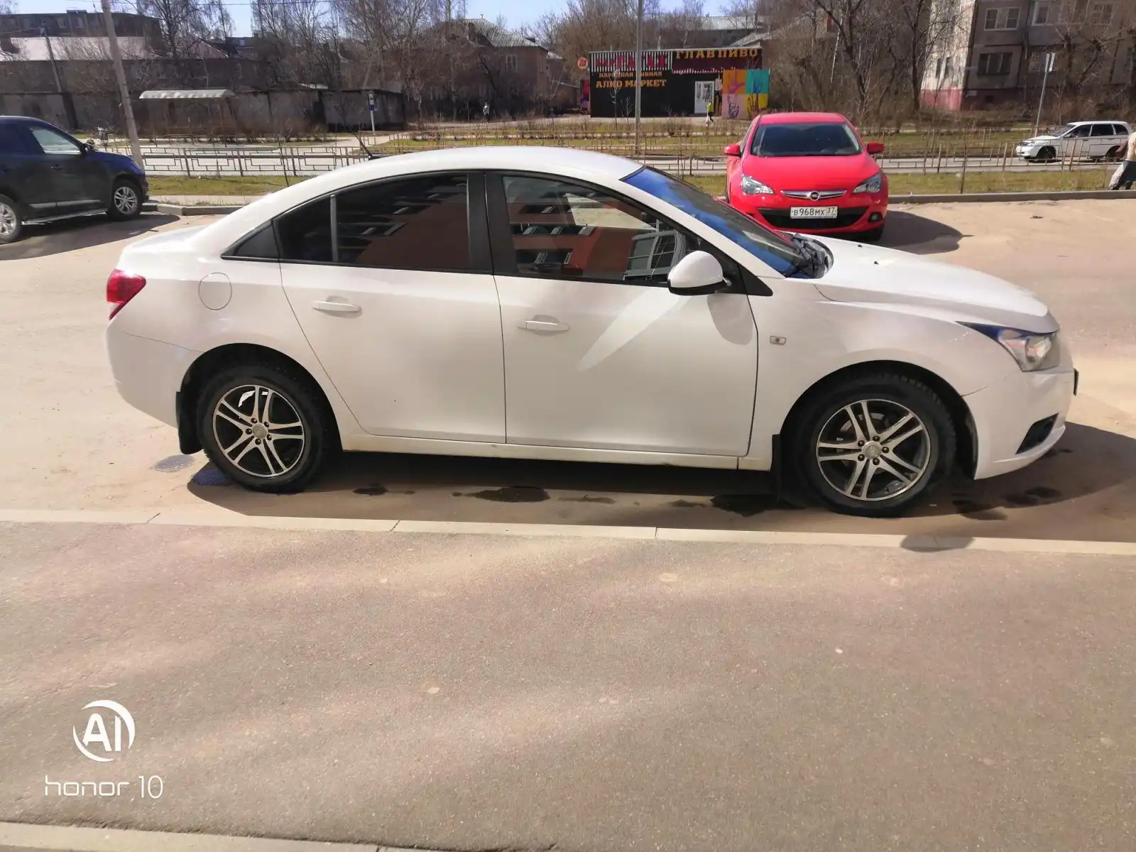 Фото автомобиля OPEL ASTRA, 2013 — госномер В968МХ37. Цвет: Красный