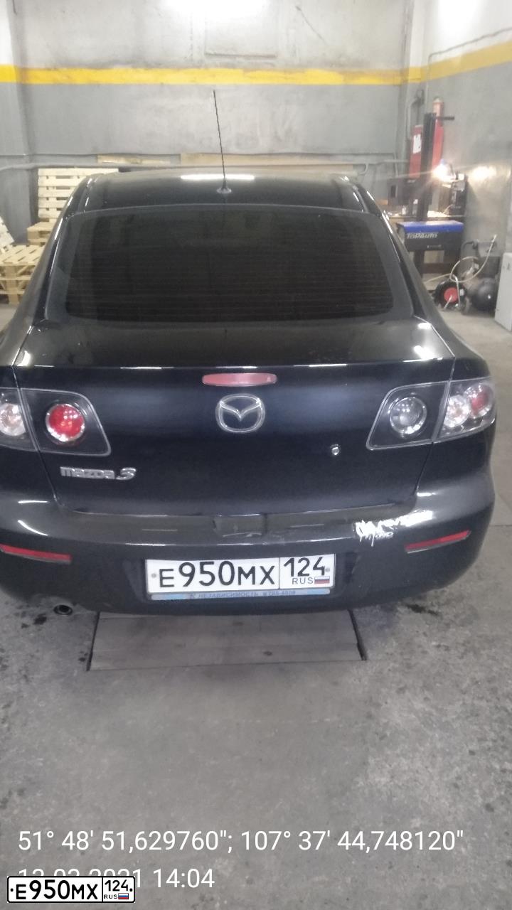 Фото автомобиля MAZDA 3, 2006 — госномер Е202УХ199. Цвет: ЧЕРНЫЙ