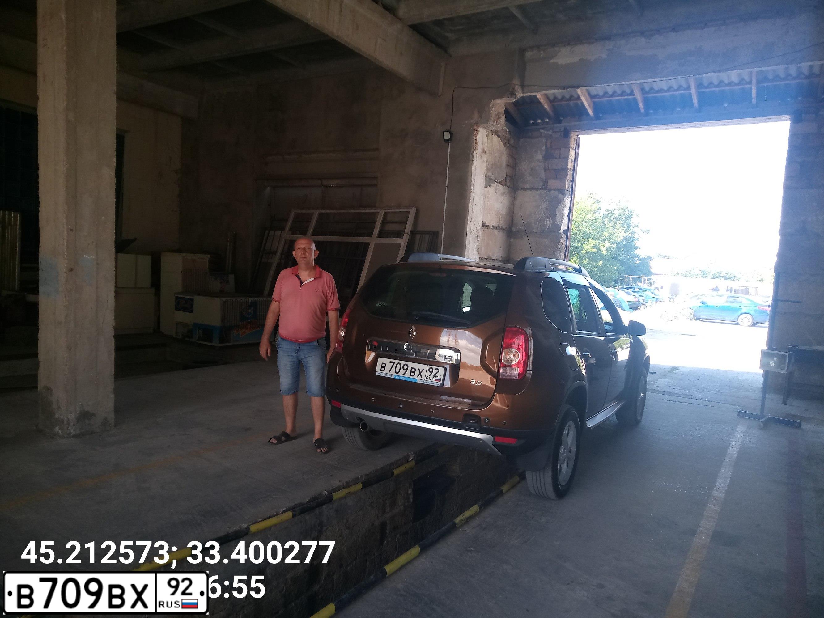 Фото автомобиля RENAULT DUSTER, 2013 — госномер В709ВХ92. Цвет: Коричневый