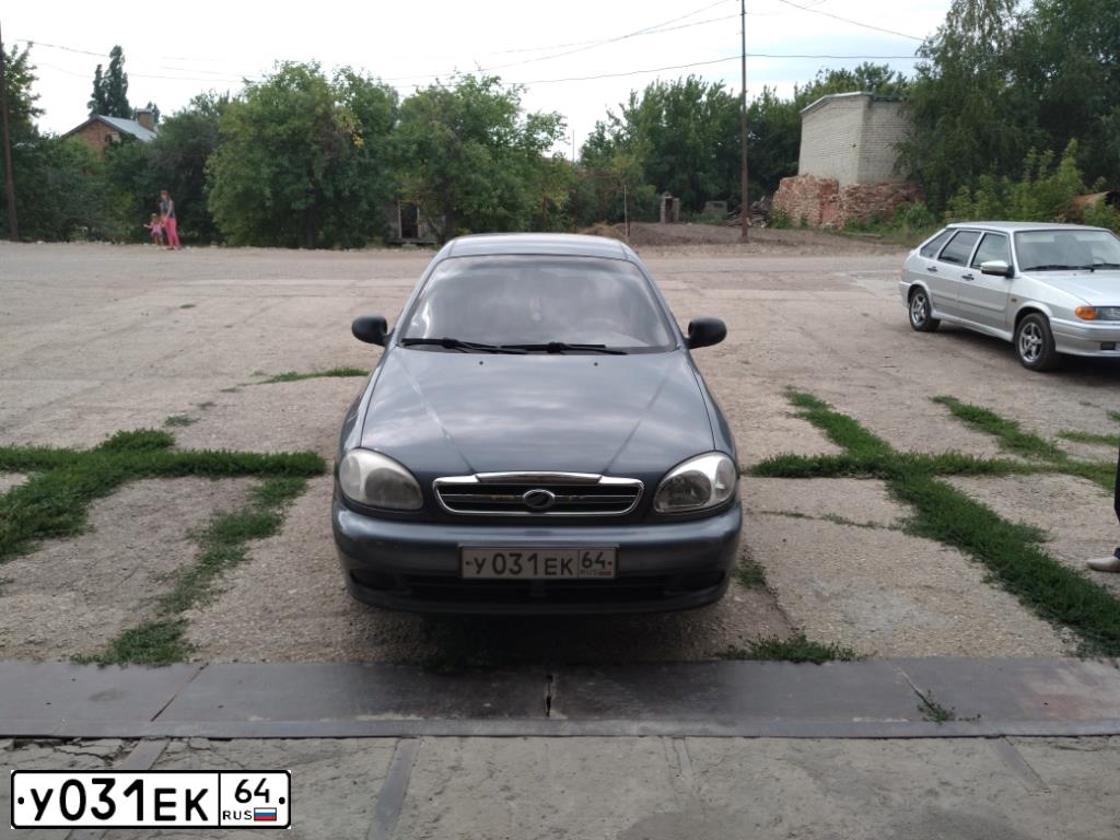 Фото автомобиля LADA 2109 SAMARA, 1994 — госномер Т870СС64. Цвет: ТЕМНО КРАСНЫЙ