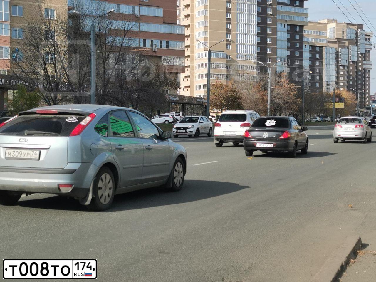 Фото автомобиля KIA SPECTRA, 2008 — госномер Т008ТО174. Цвет: ЧЕРНЫЙ