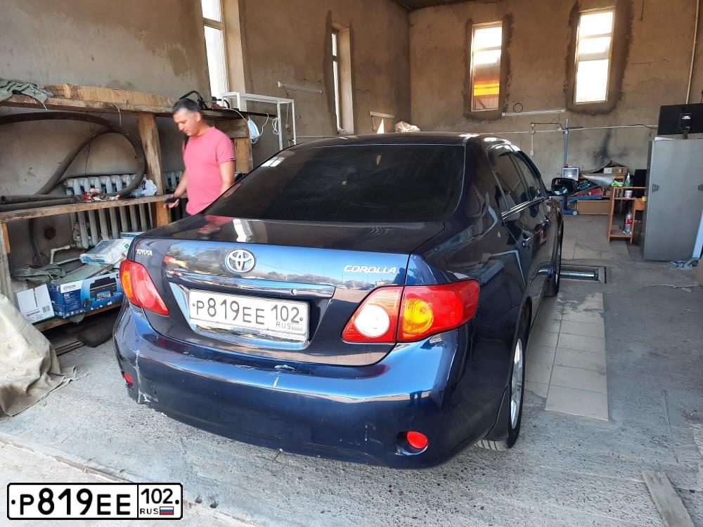 Фото автомобиля TOYOTA COROLLA, 2007 — госномер Р819ЕЕ102. Цвет: ТЕМНО-СИНИЙ