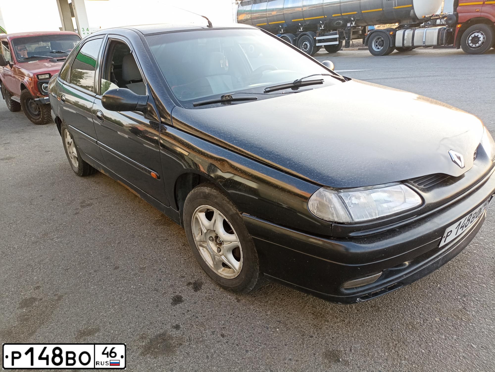 Фото автомобиля RENAULT LAGUNA, 1997 — госномер Р148ВО46. Цвет: ЧЕРНЫЙ