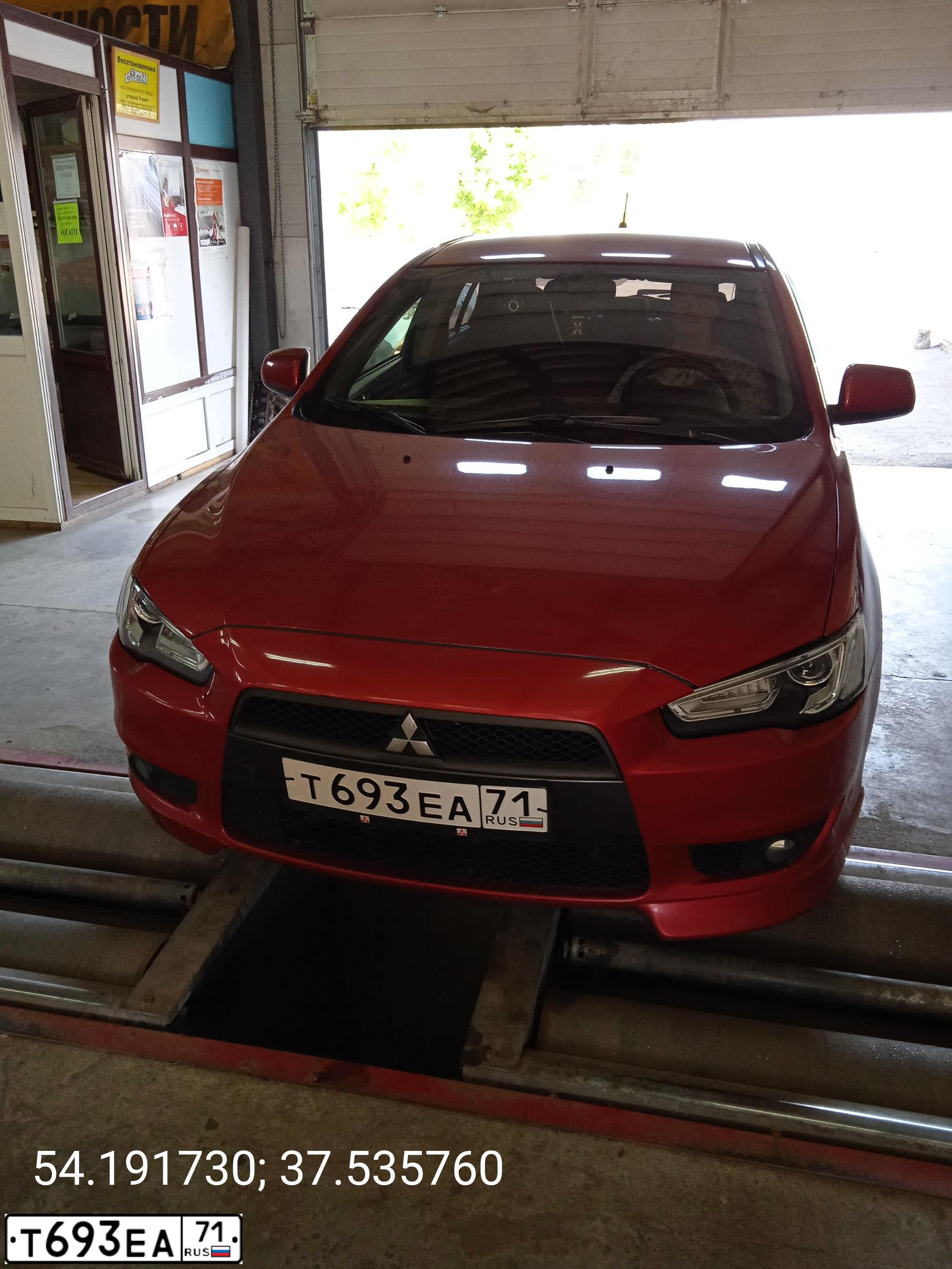 Фото автомобиля MITSUBISHI LANCER, 2008 — госномер Т693ЕА71. Цвет: Красный