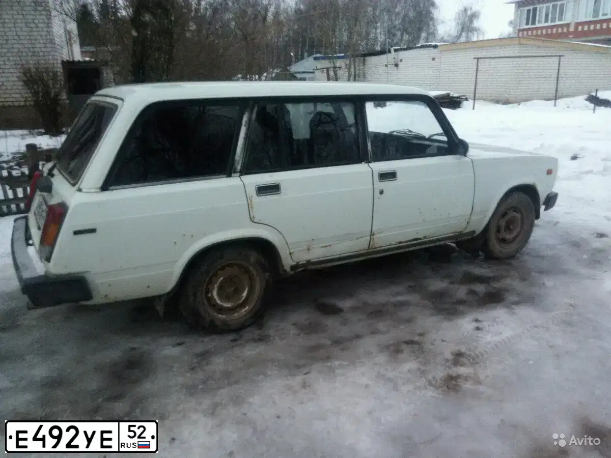 Фото автомобиля LADA 2104 LADA, 1997 — госномер Е492УЕ52. Цвет: Белый