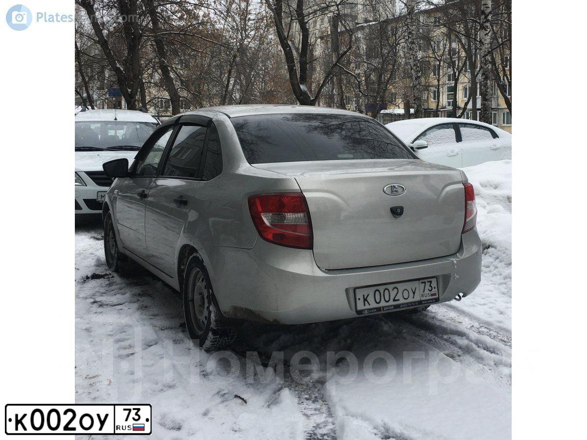 Фото автомобиля FORD FOCUS, 2011 — госномер К002ОУ73. Цвет: ЧЕРНЫЙ