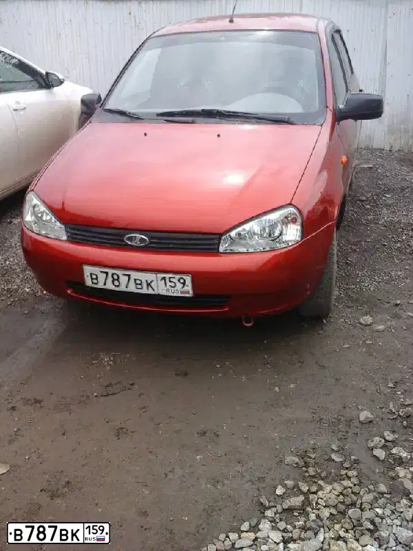 Фото автомобиля LADA 1119 KALINA, 2012 — госномер В787ВК159. Цвет: СЕРЕБРИСТО-КРАСНЫЙ