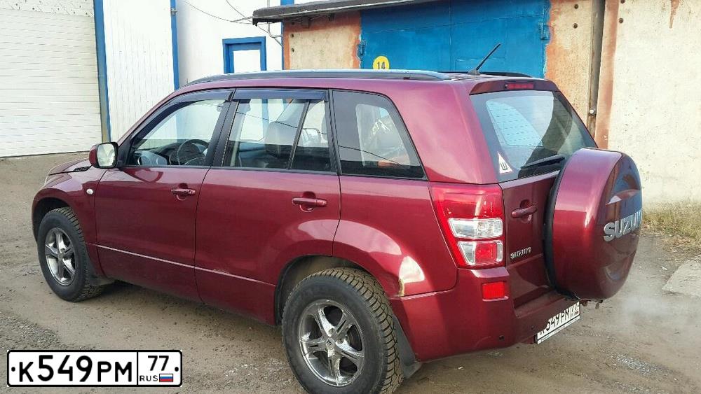 Фото автомобиля SUZUKI /GRAND/ VITARA, 2006 — госномер А624НС177. Цвет: Красный