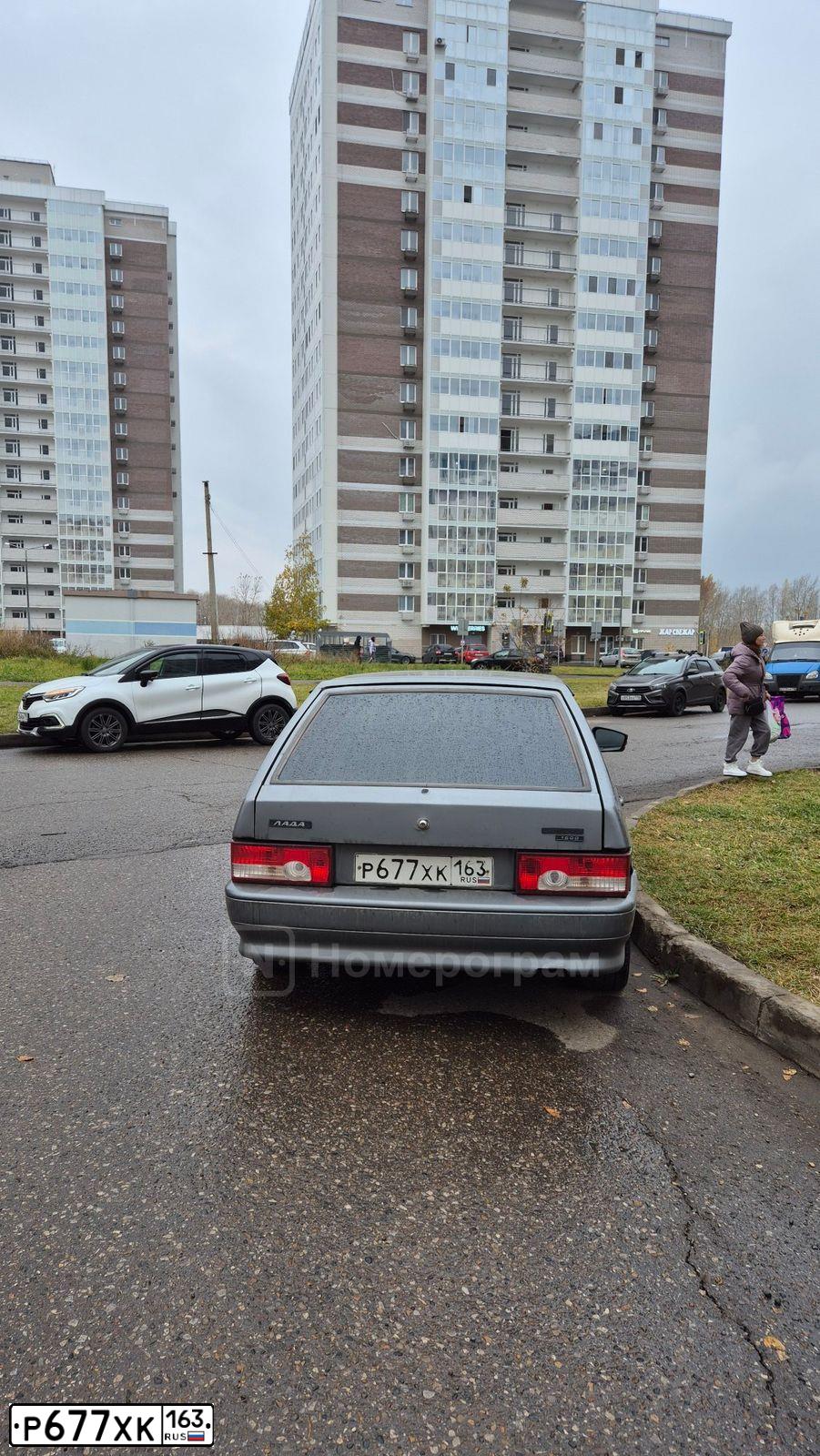 Фото автомобиля LADA 2114 SAMARA, 2009 — госномер А405СР163. Цвет: средний серо-зеленый металлик