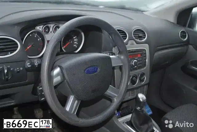 Фото автомобиля FORD FOCUS, 2011 — госномер К574РО35. Цвет: ТЕМНО-СИНИЙ