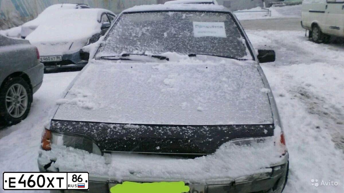 Фото автомобиля KIA RIO, 2012 — госномер Е460ХТ86. Цвет: голубой